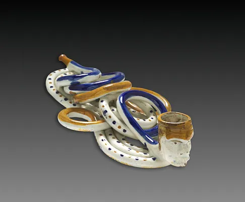 Pipe in the Form of a Twisted Man