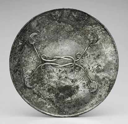 Mirror with a Handle in the Form of a Herakles Knot