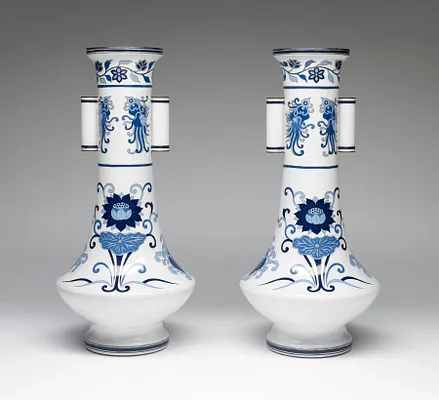 One of a Pair of Vases Decorated with Blue and White Ceramic Designs