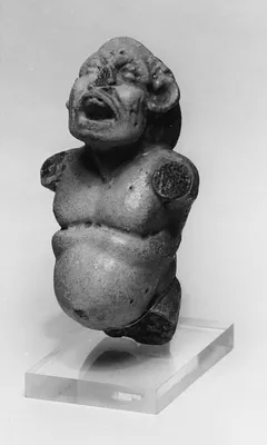 Figure with Open Mouth and Large Belly