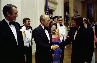 President Gerald R. Ford Shaking Hands with Tennis Player Jimmy Connors in the Receiving Line at a State Dinner Honoring Prime Minister Malcolm Fraser of Australia