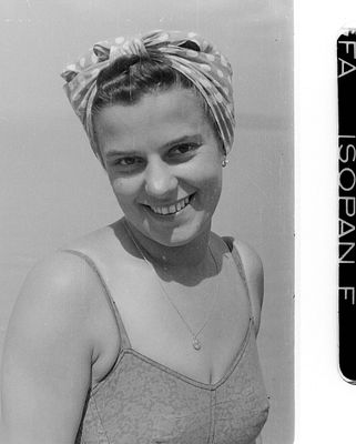 Joyful Young Woman in Bathing Suit