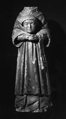 Saint Denis, Holding His Severed Head