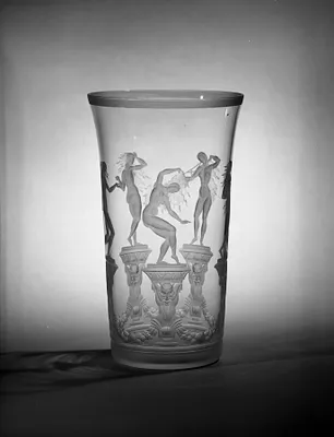 Five female figures on pedestals