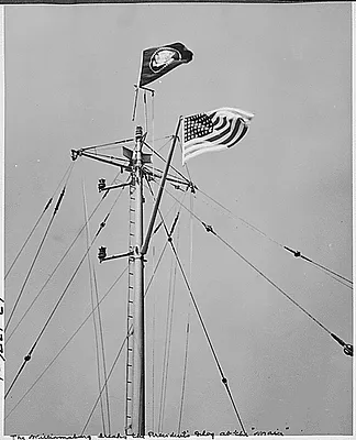 Photograph of the presidential flag flying above President Truman's yacht, the U.S.S. WILLIAMSBURG