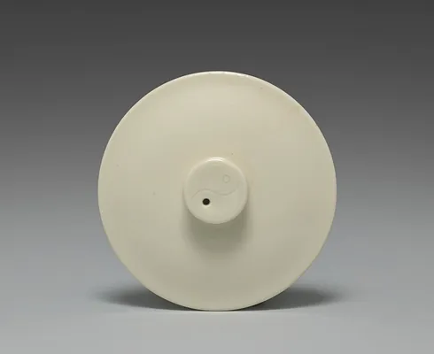 Lid for a Hand-held Teapot