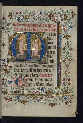 Two souls kneel in prayer in purgatory
