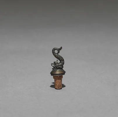 Stopper for a Scent Bottle