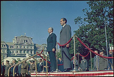 President Nixon and the Shah of Iran on the reviewing stand, on the south lawn of the White House