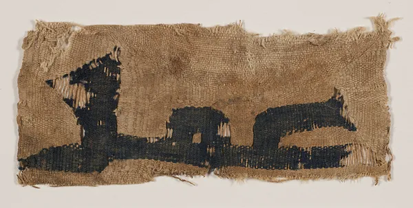 Tiraz fragment with blue text on undyed ground