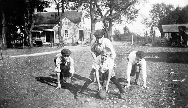 Boys Playing Football, Webster City, 1919