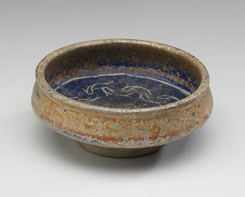 Bowl with Rosette and Band of Fish