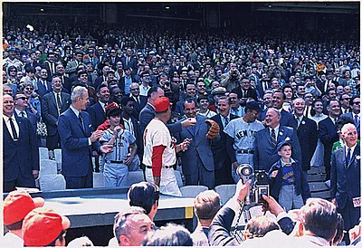 President Nixon throwing out the first ball on opening day of the 1969 baseball season between the Washington Senators and the New York Yankees