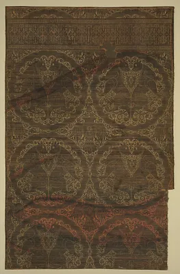 Cloth of gold with felines and eagles