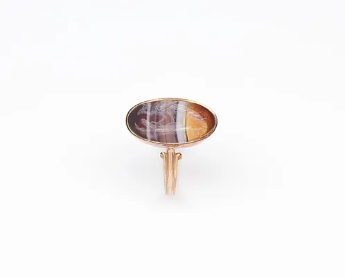 Intaglio with a Peacock over a Rudder Set in a Ring