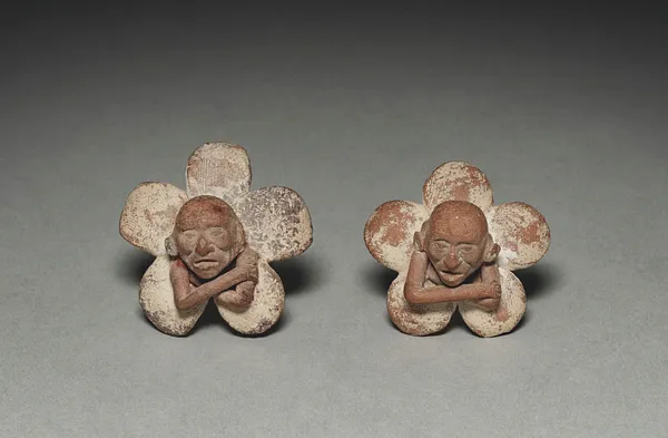 Pair of Figure in Flower Ornaments
