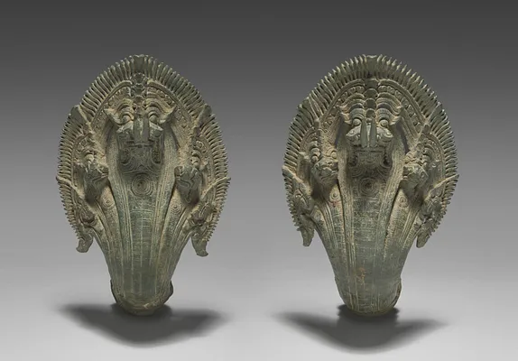 Pair of naga finials