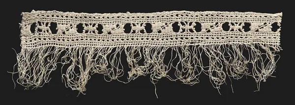 Lace fragment with fringe
