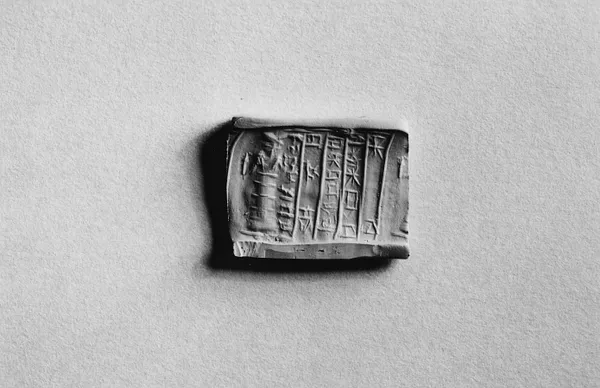 Cylinder Seal with a Standing Figure and an Inscription