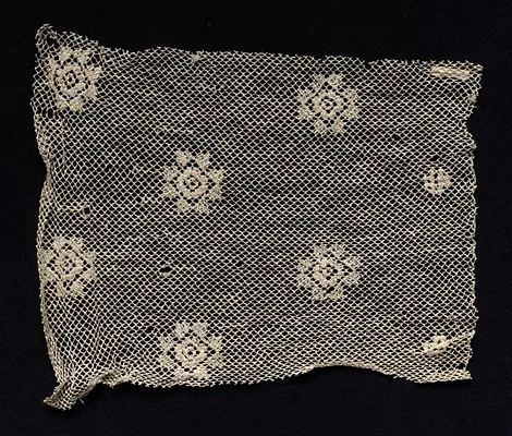Fragment of a Band with Floral Motif