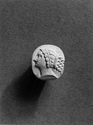 Finger Ring with a Medallion with a Woman's Head in Profile