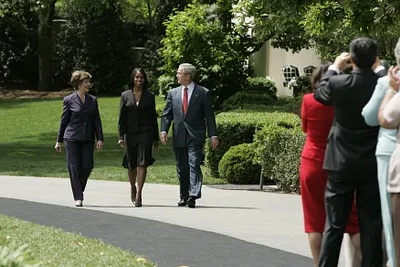 President George W. Bush and Mrs. Laura Bush Accompany 2006 National Teacher of the Year Kim Oliver to the South Lawn Ceremony in Her Honor