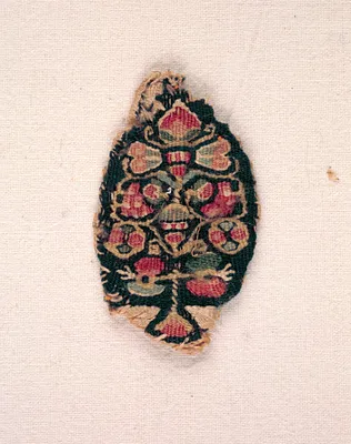 Pendant of a Clavus (?)