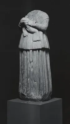 Standing Figure of a Girl Holding a Bird
