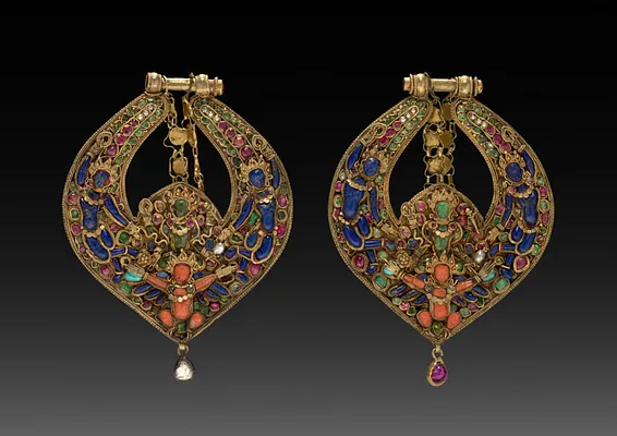 Pair of Deity Earrings with Vishnu on Garuda (front) and chepu (monster mask) (back)