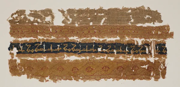 Tiraz fragment with decorative bands of stylized motifs and inscriptions