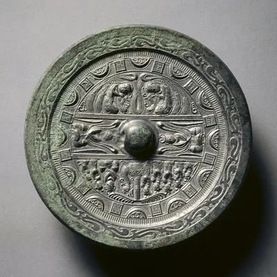 Mirror Featuring Deities and Kings in Three Sections Surrounded by Rings of Squares and Semicircles