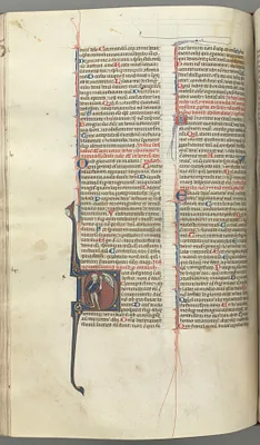 Fol. 222v, Psalm 52, historiated initial D, a fool naked but for a cloak, holding a bladder, bust of God above