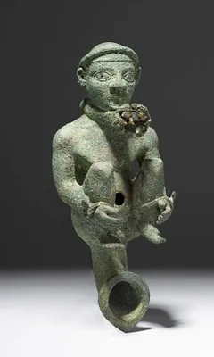 Oil Lamp with Bound Prisoner