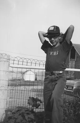 Young Boy by Fence, Hubbard, 1969
