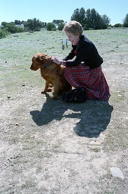 Nancy Reagan with dog "Victory" at Rancho Del Cielo during a trip to California