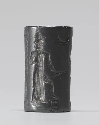 Cylinder Seal with a Presentation Scene and an Inscription