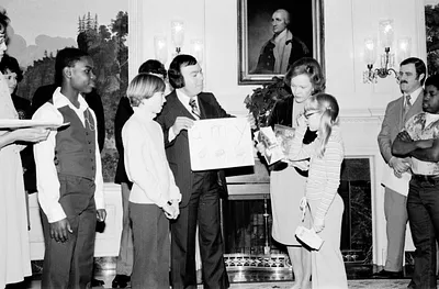 Rosalynn Carter and Amy Carter with a Group of Hearing Impaired Students Touring the White House