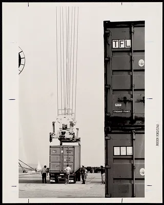 Securing a container to a truck chassis at Massport's Conley Terminal, South Boston