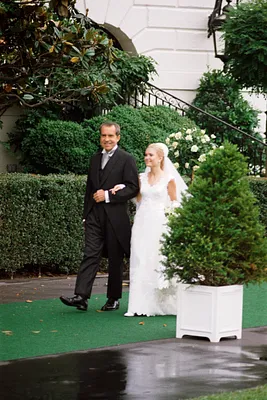 President Richard M. Nixon Escorts Daughter Tricia to Her Wedding in the White House Rose Garden