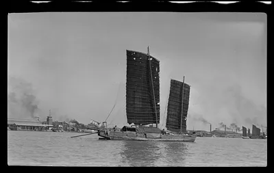 Junks seen from deck of Pres. McKinley, Whangpoo River approaching Shanghai