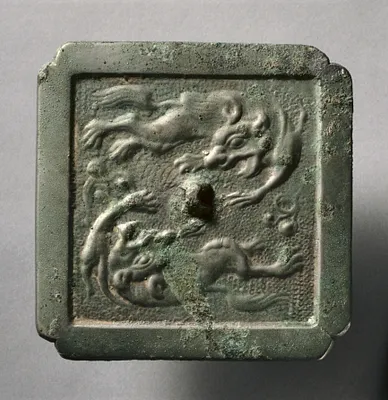 Cruciform Mirror with Two Lions