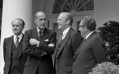 French Minister of Foreign Affairs Jean Sauvagnargues, President Valery Giscard d'Estaing of France, President Gerald R. Ford, and Secretary of State Henry Kissinger Standing Near the White House Colonnade