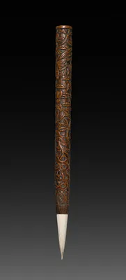 Brush with Carved Designs