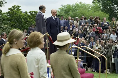 President Gerald R. Ford and President Valery Giscard d'Estaing of France Standing on a Platform on the South Lawn of the White House during the State Arrival Ceremony for Giscard d'Estaing