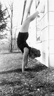 Young Girl Performing a Handstand, 1955, Vinton, United States