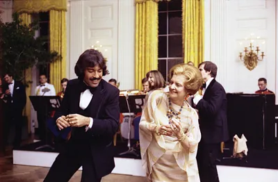 Singer Tony Orlando and First Lady Betty Ford Dancing following  a State Dinner Honoring President Kekkonen of Finland
