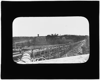Distribution Department, raising 48-inch pipe on trestle, Beacon Street, Mass., 1886