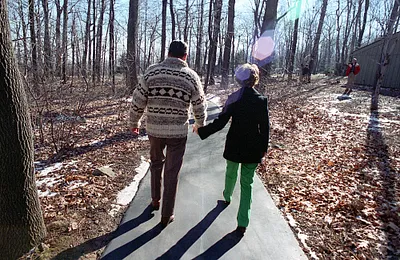 President and Nancy Reagan walking at Camp David, Maryland