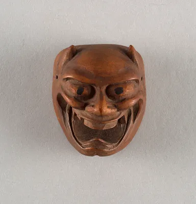 Grinning demon