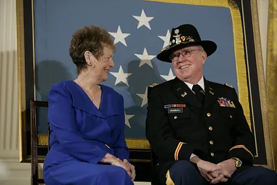 U.S. Army Major Bruce P. Crandall Sits with His Wife, Arlene, Prior to Being Awarded the Medal of Honor